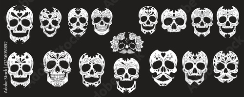 Vector set of white decorative sugar skulls for the Day of the Dead, featuring ornate floral and geometric designs 