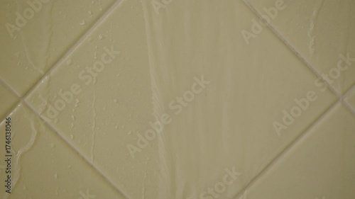 Yellow tiles and clear water