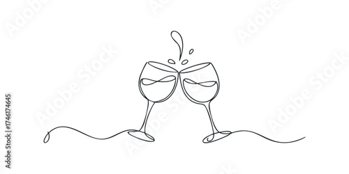 Two wine glasses clinking in celebration with splash