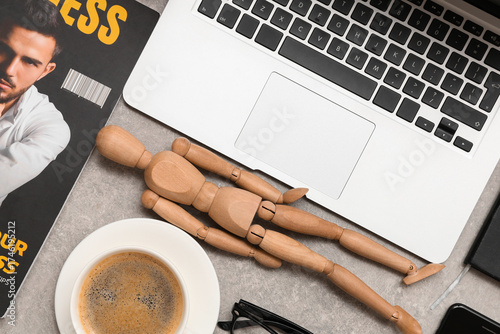Modern laptop, cup of coffe...