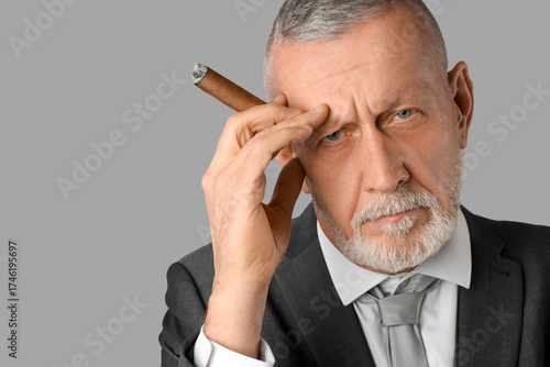 Portrait of old businessman...
