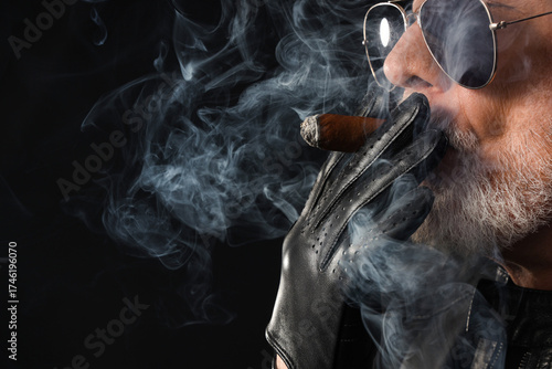 Stylish old man in leather ...