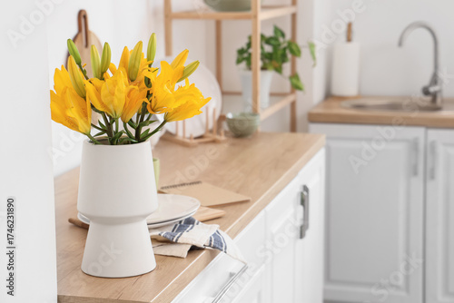 Vase with beautiful lily fl...