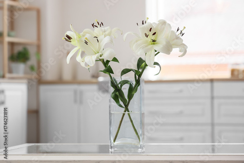 Vase with beautiful lily fl...