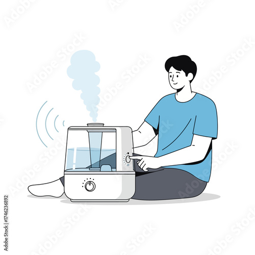 Man operating a humidifier for better air quality.