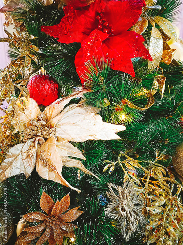 Christmas tree with decorations. Close-up, selective focus. Vertical photograph.
