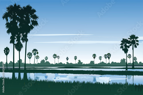 Serene landscape featuring palm trees and a reflective water surface