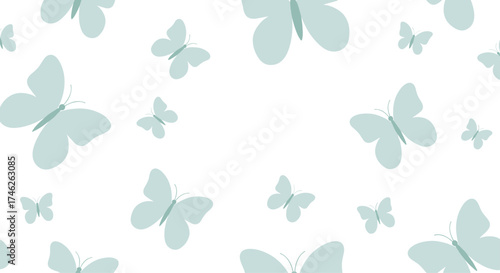 A collection of light blue butterflies flying across a white background.