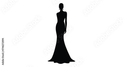 Elegant silhouette of a woman in a flowing black evening gown striking a posing fashion stance
