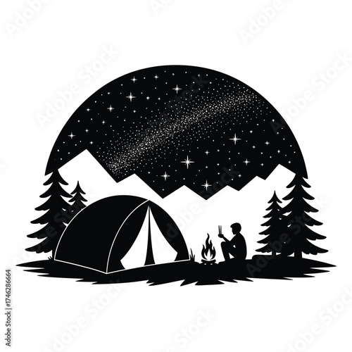 Silhouette of camping tent under starry night sky with mountains