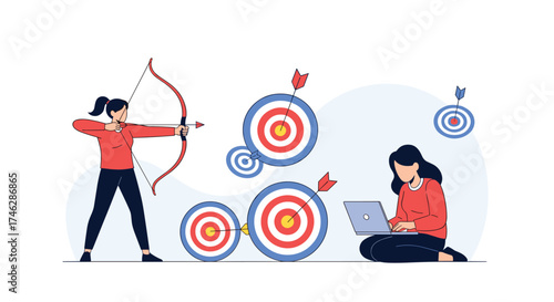 Two women working together towards their goals and objectives.