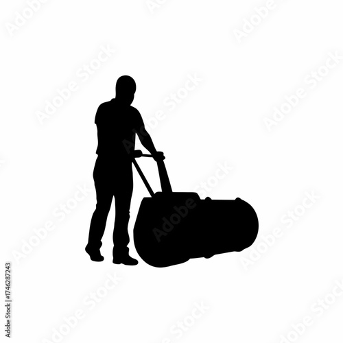 Silhouette of a road construction worker operating asphalt roller isolated on white background