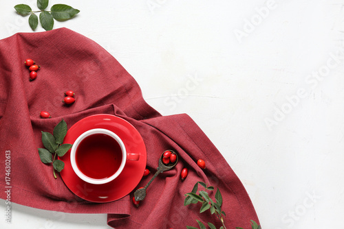 Cup of hot rose hip tea and...