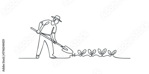 Man planting saplings with shovel