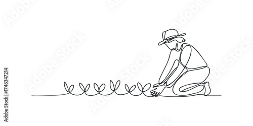 Gardener planting sprouts in soil with hat