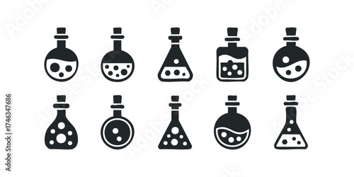 Collection of sealed laboratory flasks with bubbly liquid
