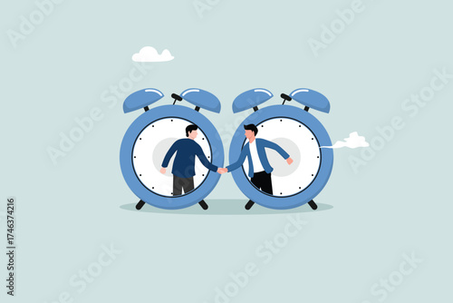 Successful time management. Knowing how to utilize time and organize it. Happy businesspeople shake hands with big clocks and can control their time.