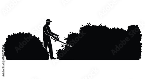 Silhouette of a gardener trimming bushes with a hedge trimmer outdoor landscaping scene