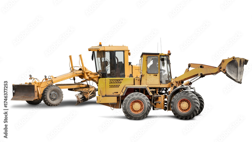 Fototapeta premium An excavator or loader and grader stand separately at a construction site, ready to begin road improvement work in a remote area. Construction equipment rental.