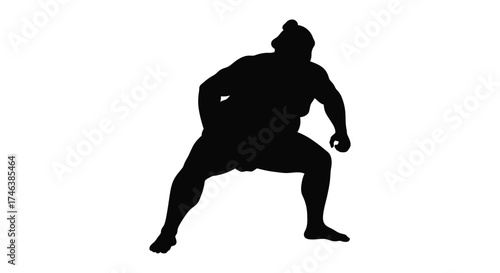 Silhouette of a powerful sumo wrestler in a dynamic low stance ready to charge in a striking pose capturing martial arts spirit