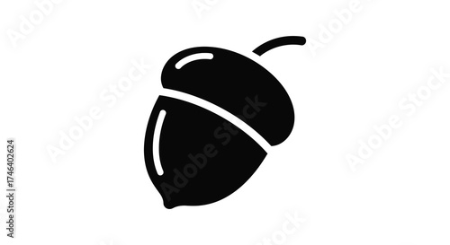 Simple black silhouette of an acorn with a stem graphic element for nature and autumn themes silhouette