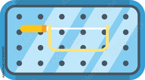 Jeweler's saw frame placed on a blue perforated board, essential tool for jewelry making and other intricate crafts
