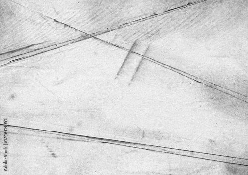 Black and white creased paper texture background. Grunge surface backdrop design. For poster, banner, cover, or overlay design.