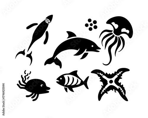 Sea life silhouettes with dolphin, fish and jellyfish