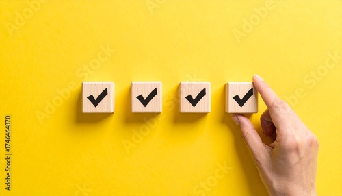 Achieve your goals with a checklist on vibrant yellow, hand adding final approval