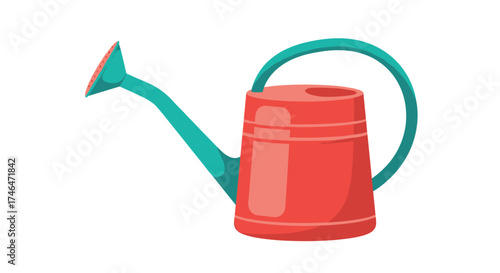 A bright red watering can with a teal handle is ready for garden tasks.