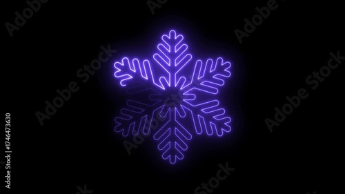 Animated glowing purple snowflake on a black background winter holiday design element