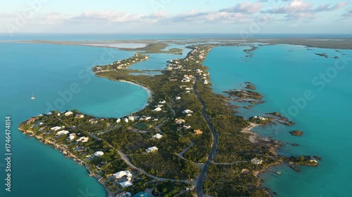 Golden hour aerial view of a luxury residential islan in the Bahamas.