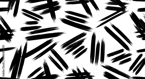 Seamless abstract pattern with black brush strokes on a white background, creating a dynamic visual texture.