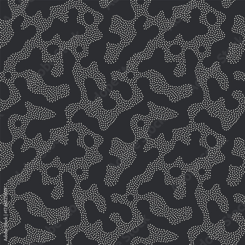 Vector seamless pattern. Free form organic shapes. Stylish structure of natural dotted spots. Hand drawn abstract background. Can be used as swatch in Illustrator. Monochrome confused print.