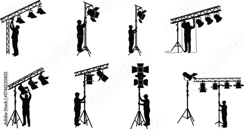 Stage lighting silhouettes, event setup, professional equipment, spotlight installation, floodlight 