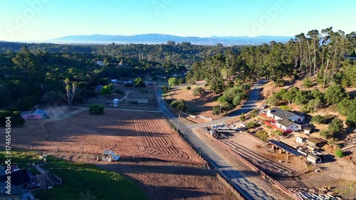 Rural Hillside Neighborhood With Trees, Dirt Lots, and Distant Salinas Valley View