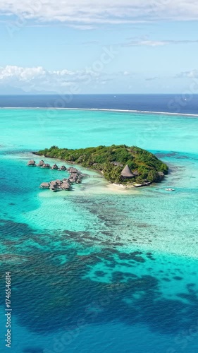 Wallpaper Mural Vertical Drone Shot of Abandoned Tropical Resort and Island in Bora Bora Lagoon, French Polynesia Torontodigital.ca