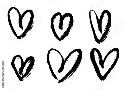 Set of black brush stroke grunge heart icons. Hand drawn doodle style vector illustration isolated on white background. Perfect for Valentine, love, decoration, and design projects.