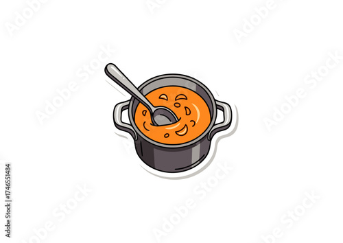 Delicious orange soup in a pot with a spoon, perfect for a warm and comforting meal