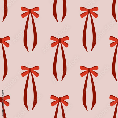 Elegant vector seamless pattern featuring rows of stylized red ribbon bows with long tails on a soft dusty pink background, perfect for romantic, feminine, or Valentine's Day designs.