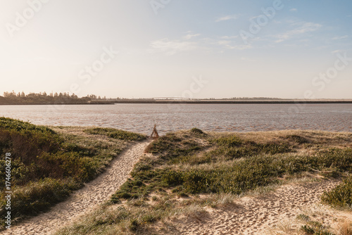 Brown water in the Hunter River as flood waters are swept out to sea
