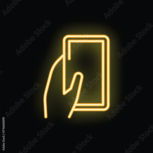 Neon sign of a hand holding a smartphone, glowing yellow on black background