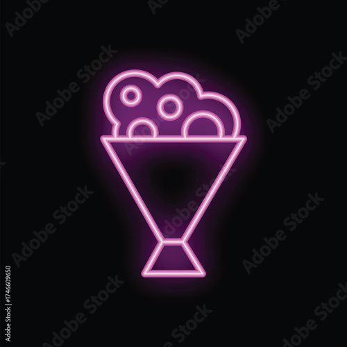 Neon sign of popcorn in paper cup glowing on black background, concept for cinema snack bar or fast food