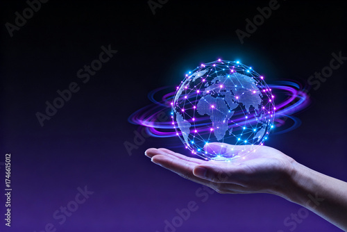 Glowing digital globe on hand