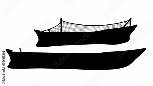 Dramatic silhouette of vintage fishing boats offers a nostalgic maritime charm and rustic nautical feel
