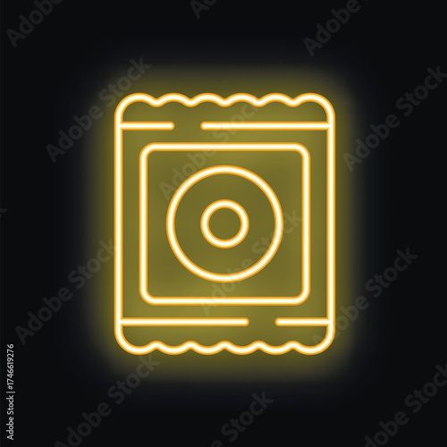 Bright yellow neon sign depicting a condom in a foil package, glowing on a black background