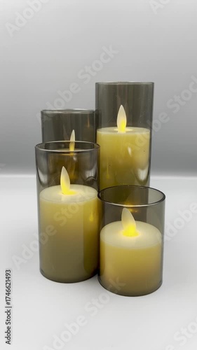 Electronic candles on a light background, Christmas decoration