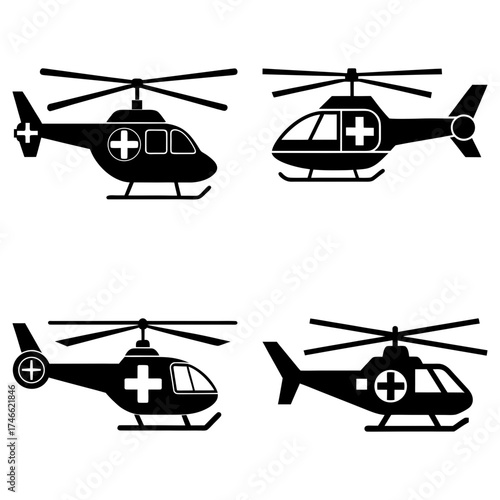 An arrangement of four black medical helicopters, each displaying a white cross symbol on their sides