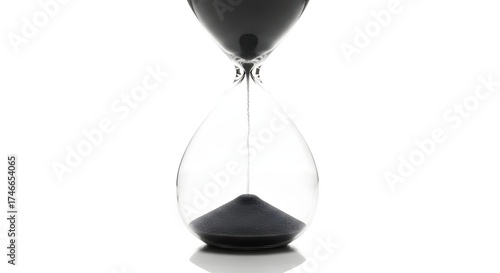 Hourglass with black sand isolated on white background