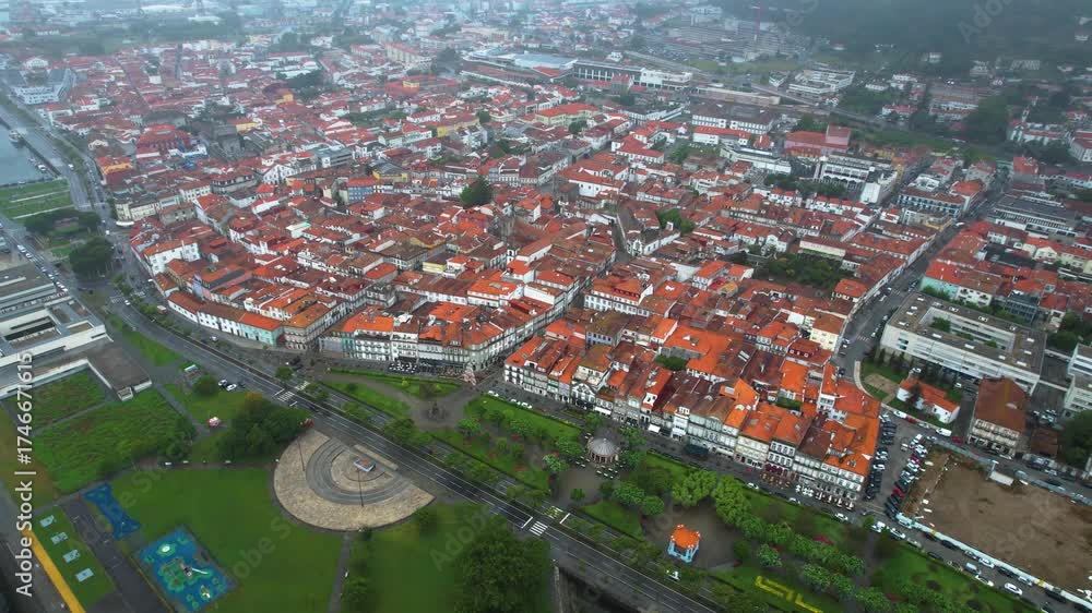 An aerial panoramic view of the old town in the City Viana do Castelo in Portugal on a cloudy day in summer. 
